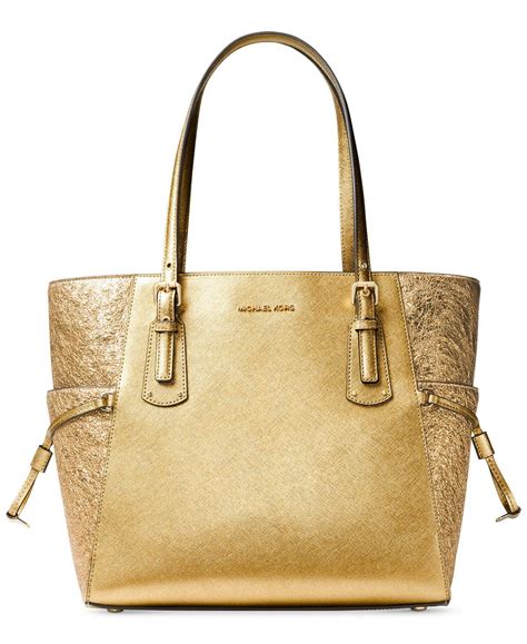 michael kors voyager west gold|Amazon.com: Michael Kors Voyager East West Tote.